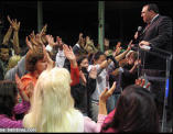 Dr. Rodney Howard-Browne giving the altar call for salvation and rededication at the Azuza meetings in 2006